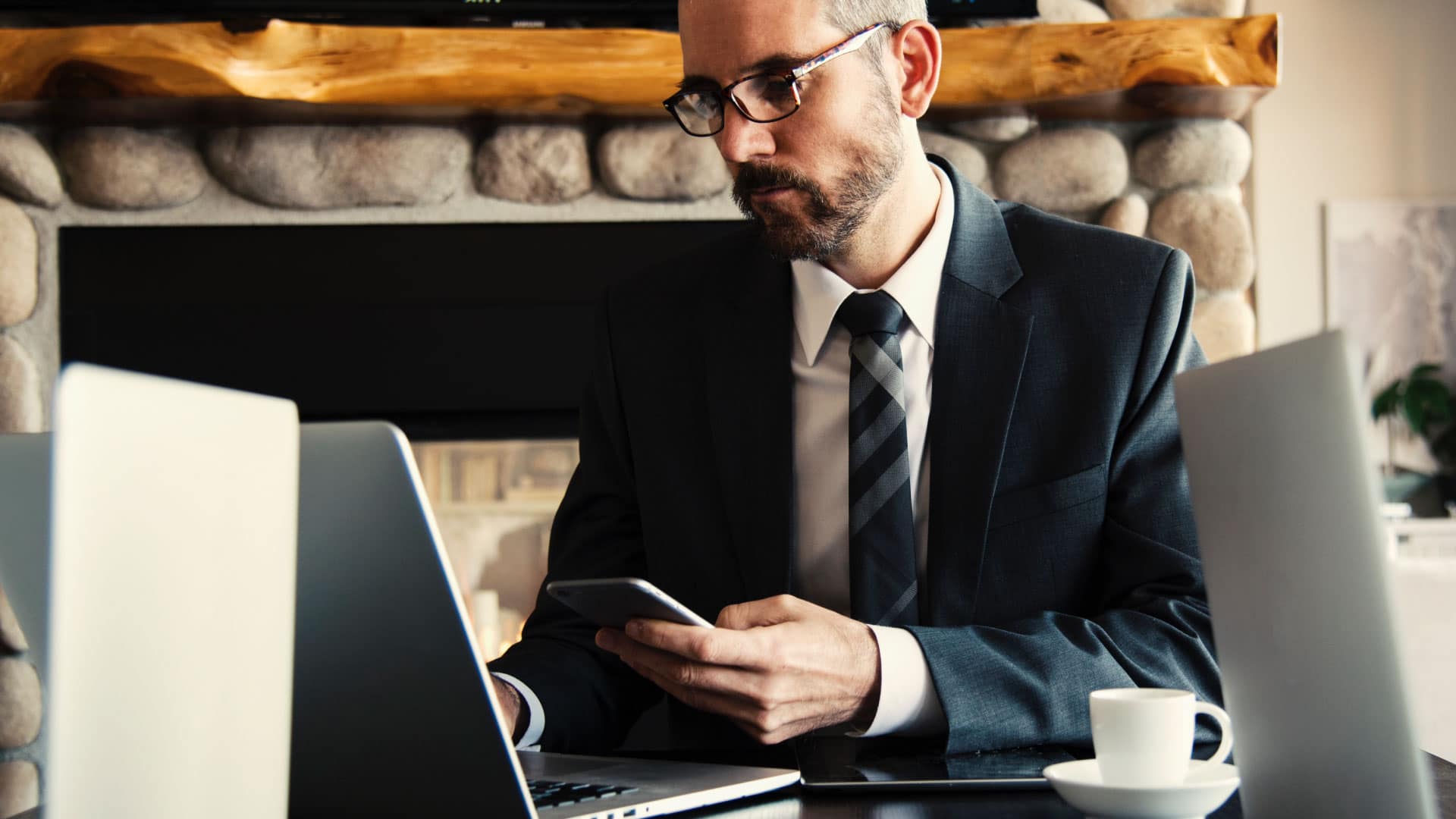 A businessperson in front of a computer, representing different types of entrepreneurs and their unique paths to success.